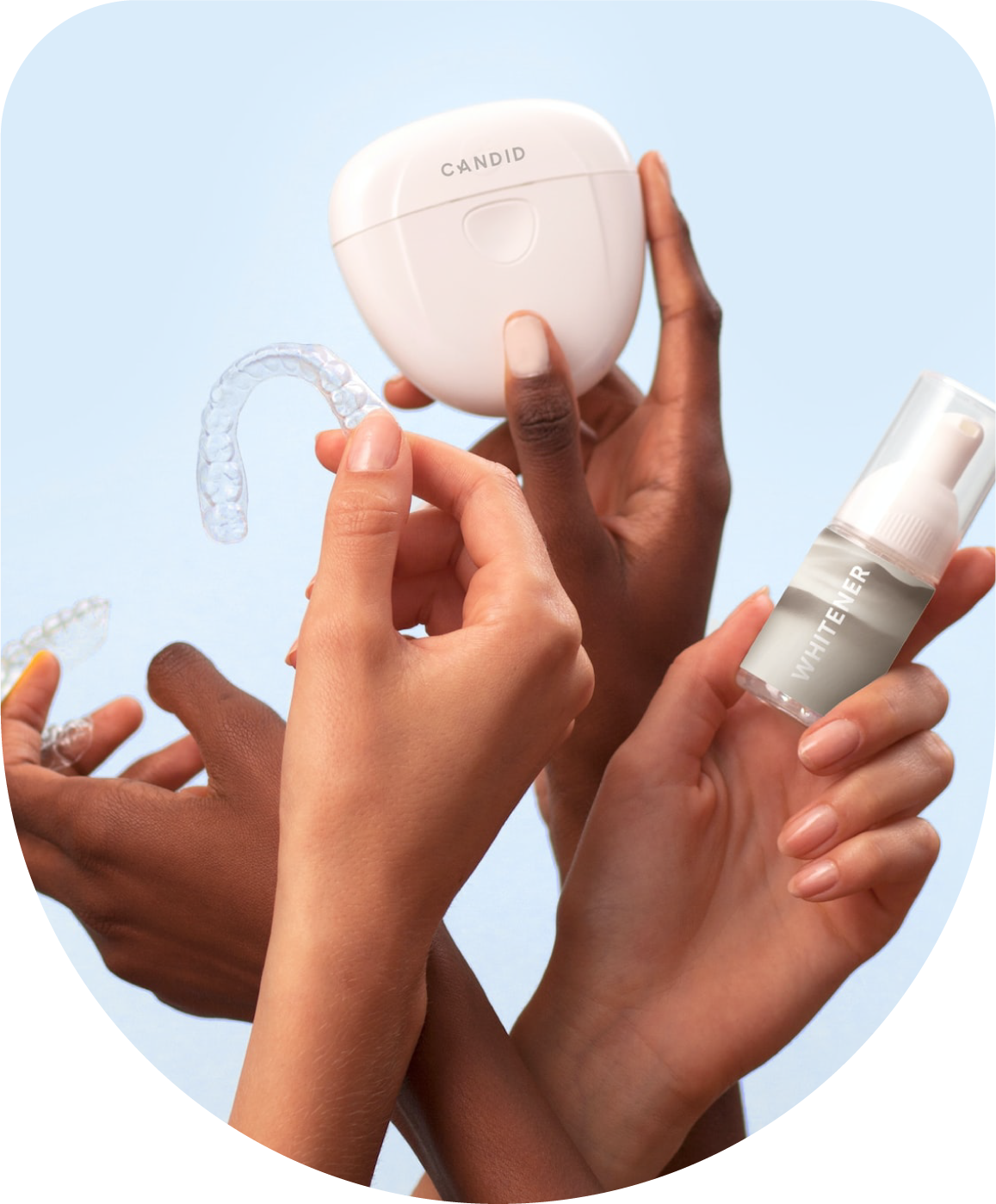 Produtos dentários em mãos diversas.